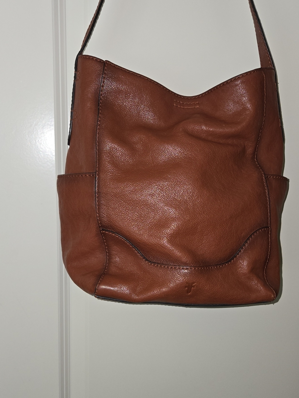 Leather Shoulder Bag in Brown slightly Worn Around Collar.  Magnetic Closure.